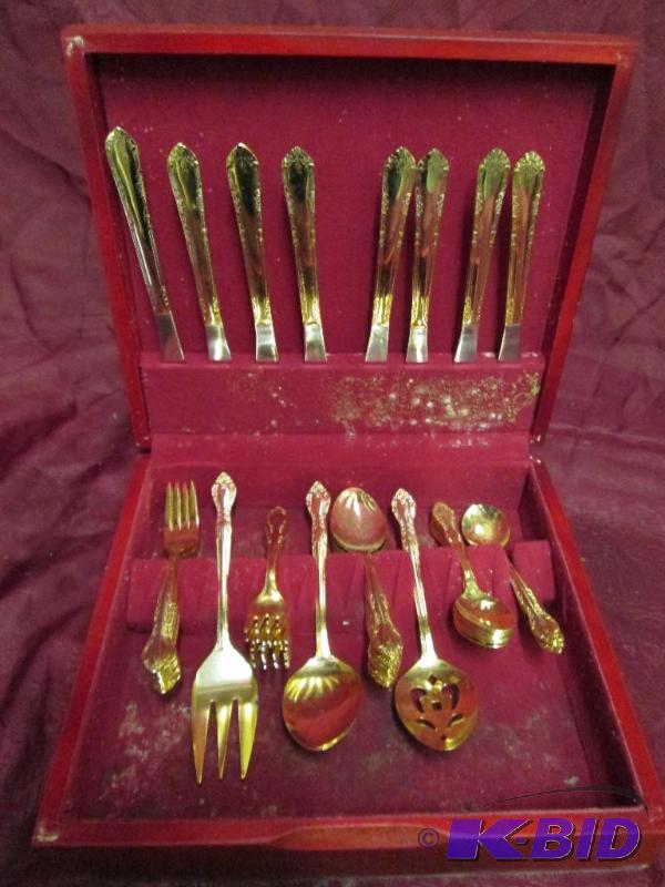 Gorgeous set of gold flatware in a ...
