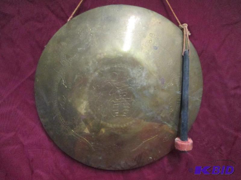 Oriental gold tone gong with mallet...