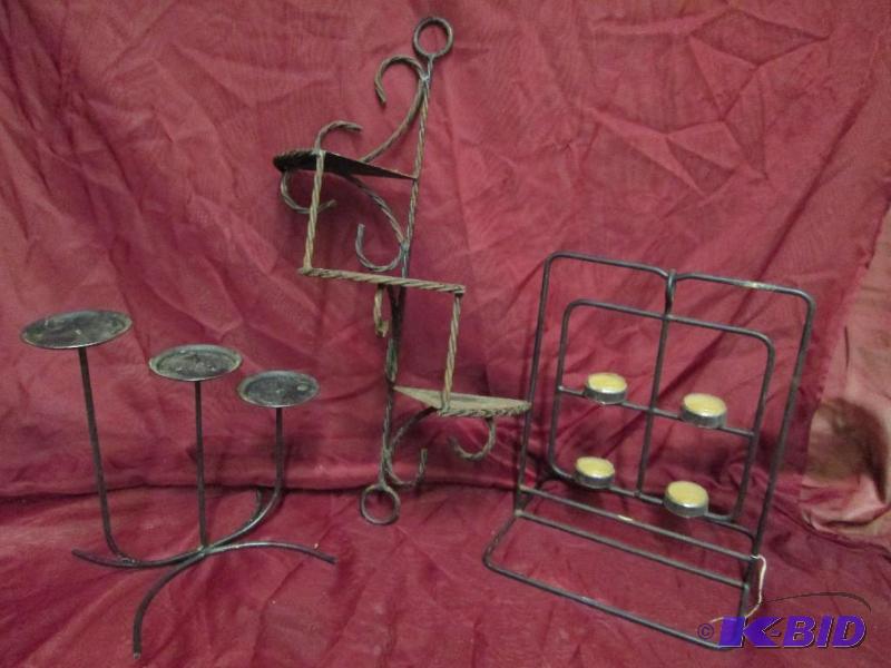 Lot of wrought iron candle holders ...