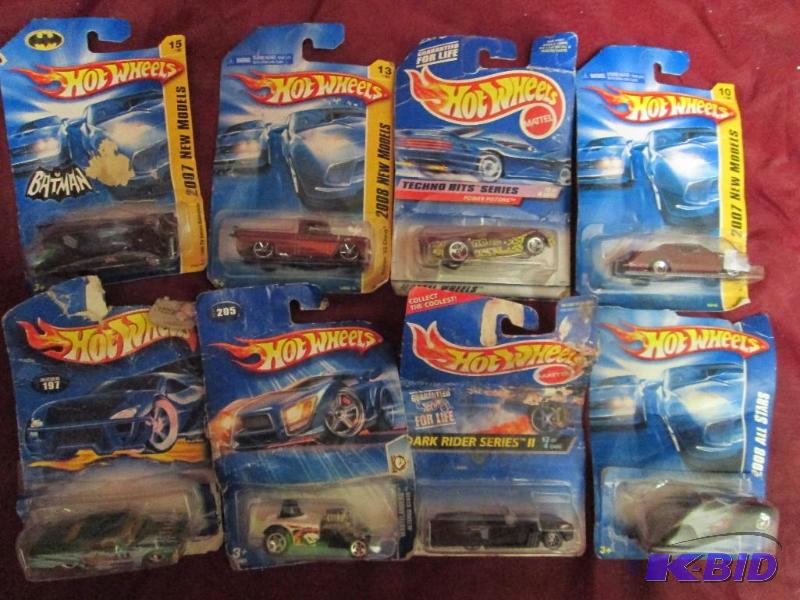 lot 11 image: Lot of 8 Hot Wheels cars and trucks...