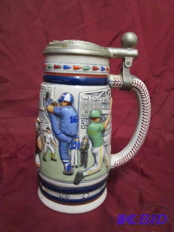 lot 18 image: 1984 Avon commemorative stein featu...