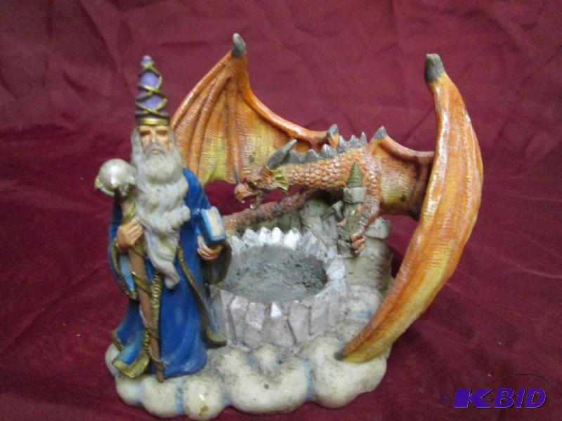 lot 29 image: Merlin and dragon resin tealightvo...