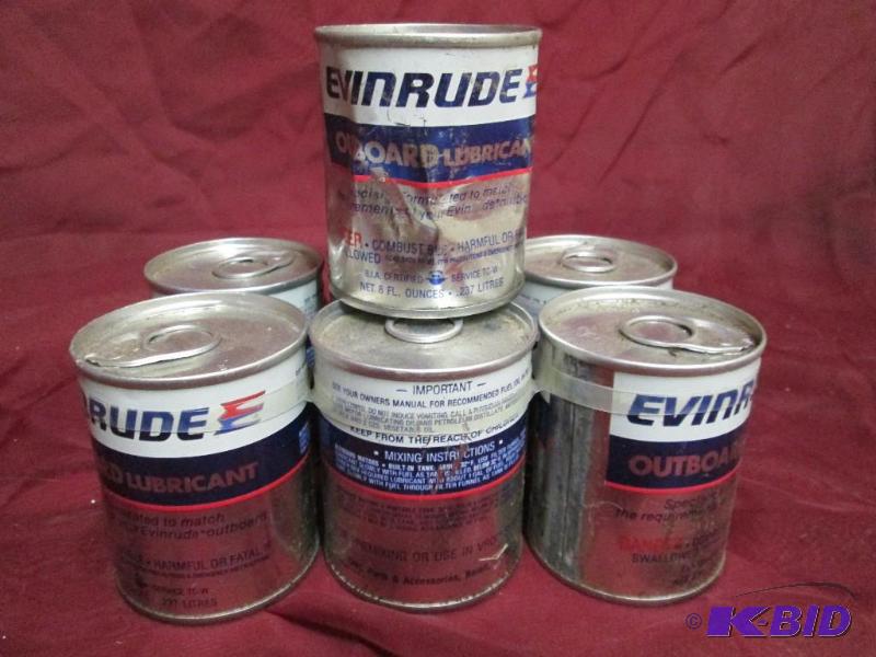 lot 79 image: 7 unopened cans of Evinrude outboar...