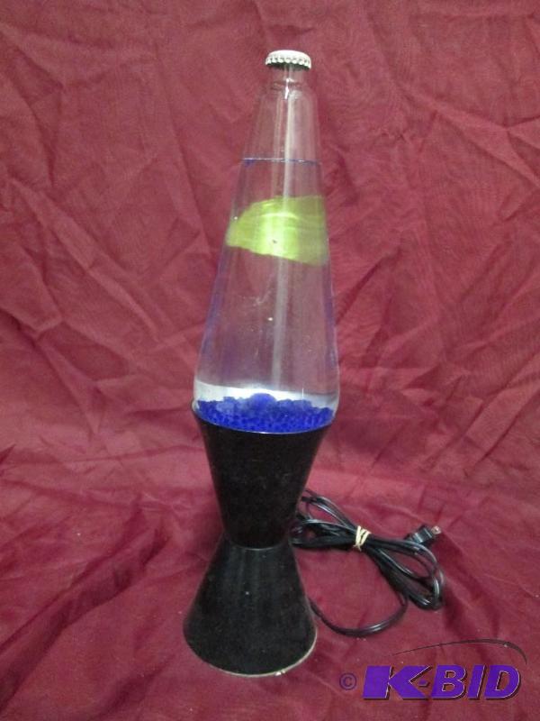 lot 8 image: Lava Lamp with purple interior colo...