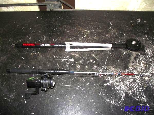 lot 52 image: Ice Fishing Rod and Reel and Magnet...