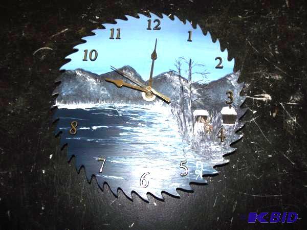 lot 56 image: Saw Blade Clock...