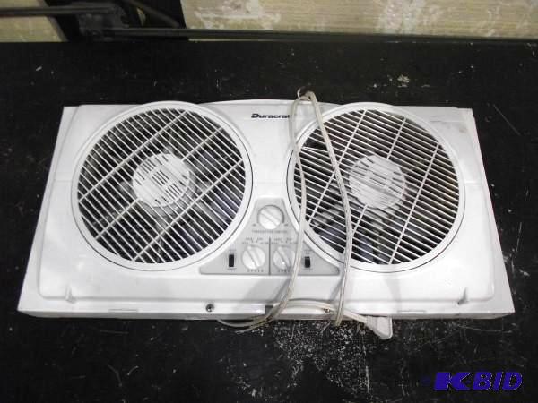 lot 60 image: Dual Window Fan   Nice for the offi...