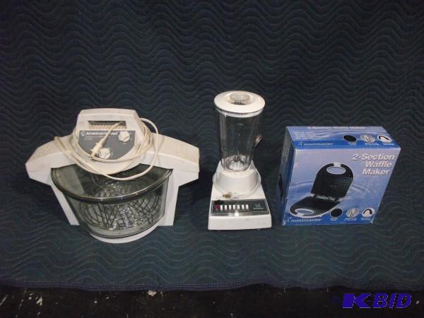 lot 19 image: (3) Kitchen Appliances And (1) Humi...