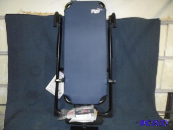 lot 8 image: Teeter Hang Ups Machine   Comes wit...