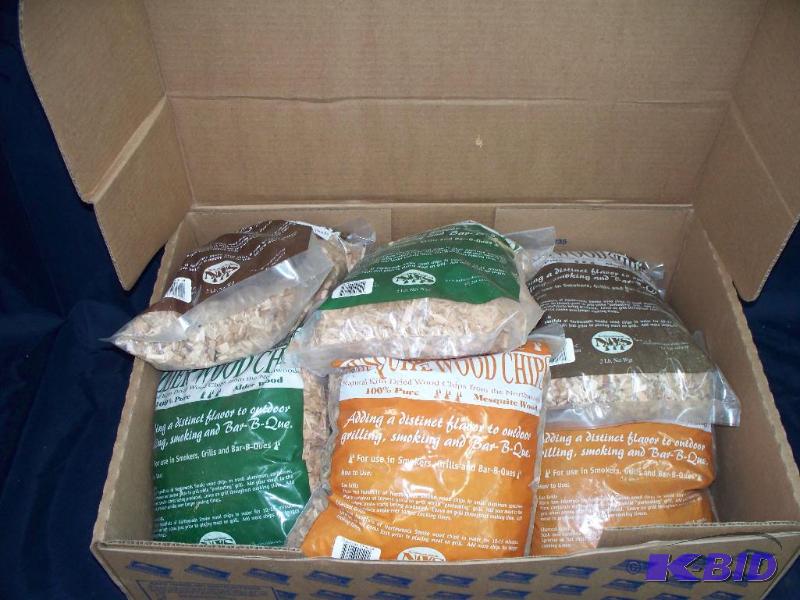 lot 29 image: CASE OF DIFFERENT FLAVORED WOOD CHI...