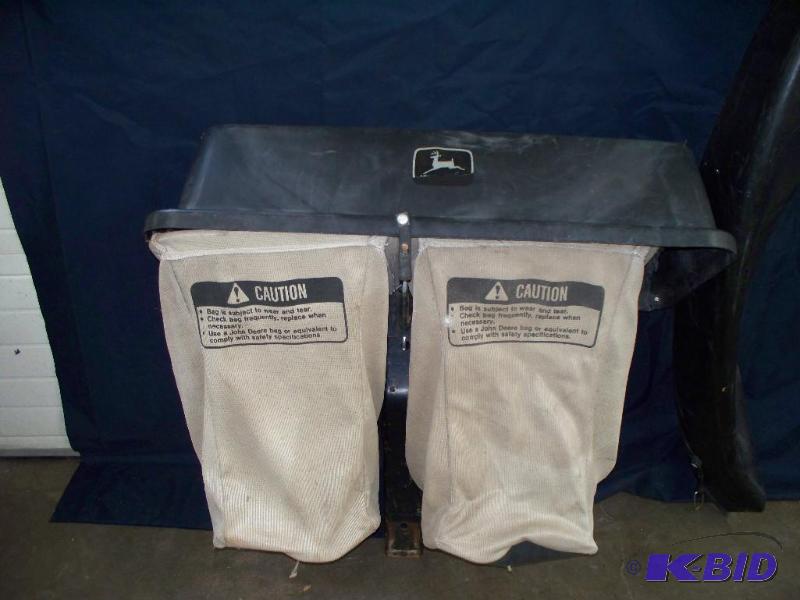 lot 54 image: JOHN DEERE BAGGER SYSTEM WILL FIT O...