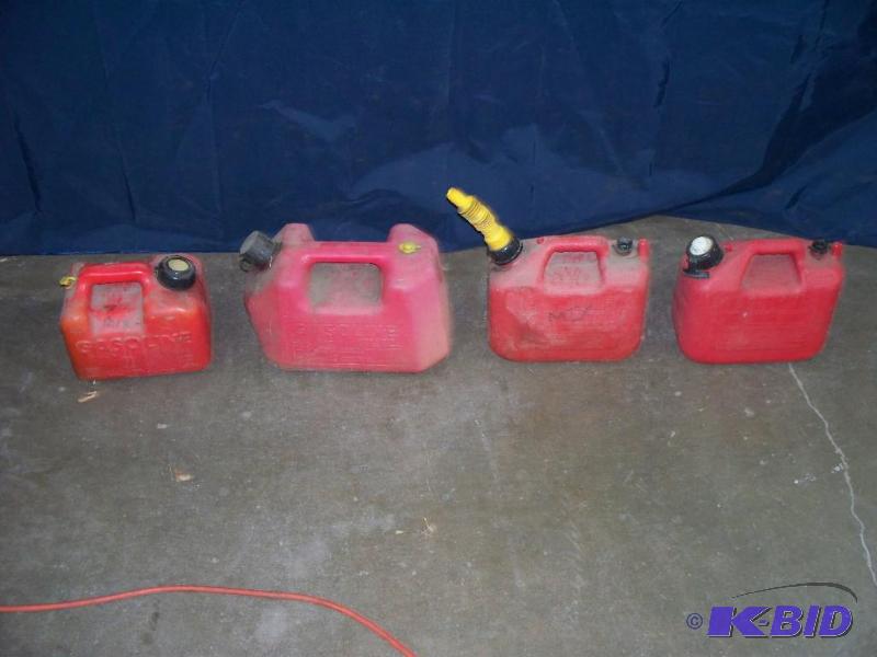 lot 75 image: 4 gas cans...