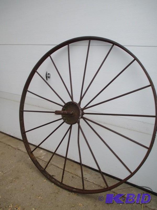 lot 129 image: Antique wagon wheel 54"...
