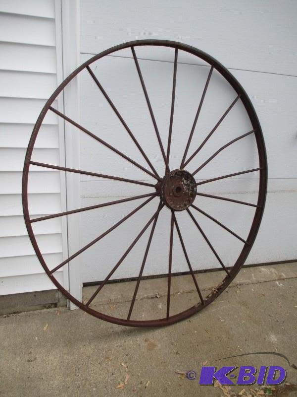 lot 130 image: Antique wagon wheel 54"...