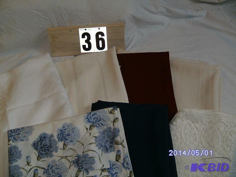 lot 36 image: Cloth Tablecloths, Qty 7 - 60"...