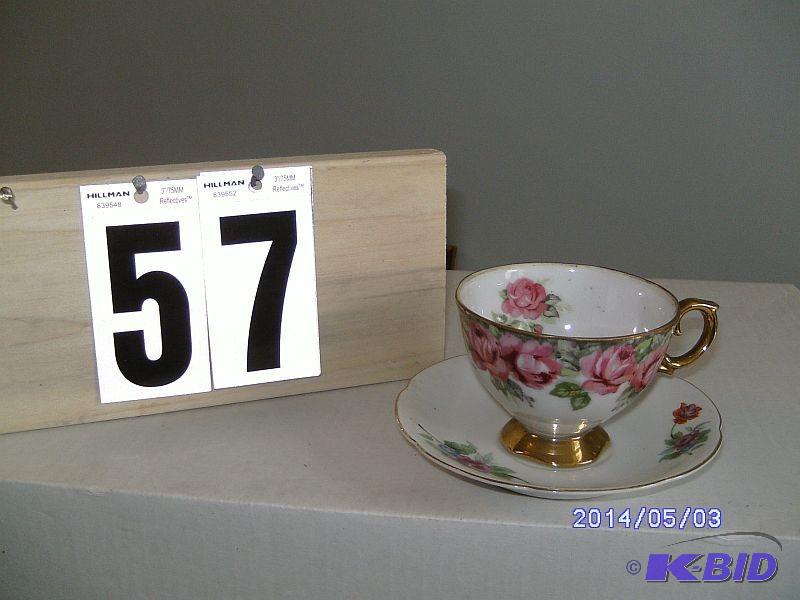 lot 57 image: China Teacup - White with rose patt...