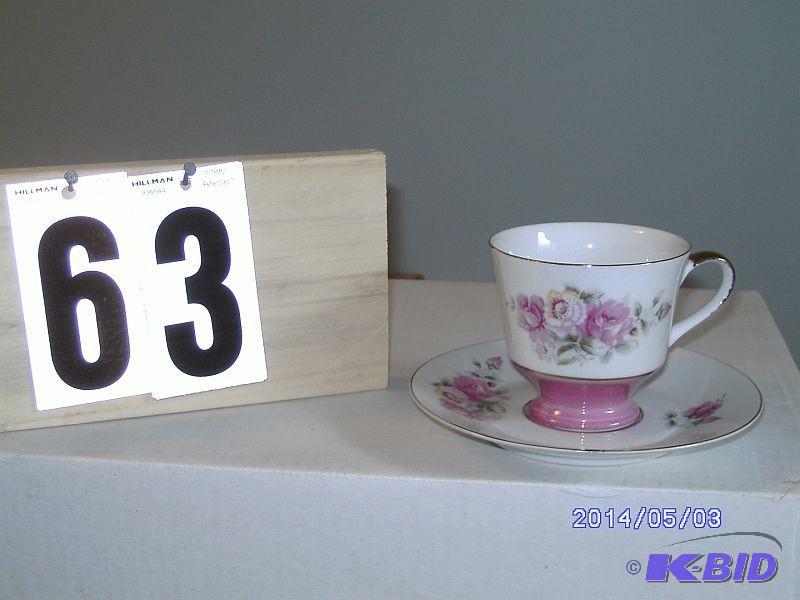 lot 63 image: China Teacup - White with pink rose...