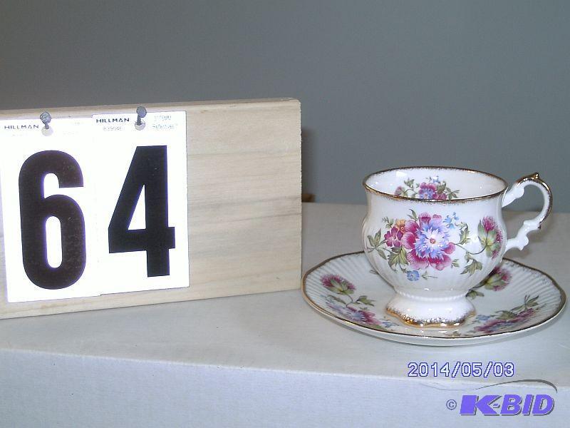 lot 64 image: China Teacup - White with floral pa...