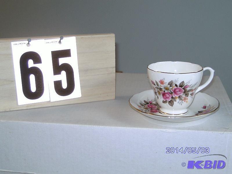 lot 65 image: China Teacup - White with rose patt...