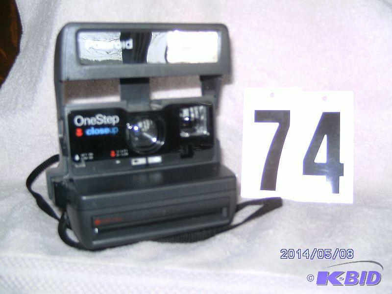 lot 74 image: Polaroid One-Step Camera...