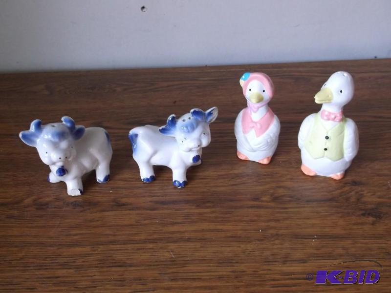 2 sets salt an pepper cows have som...