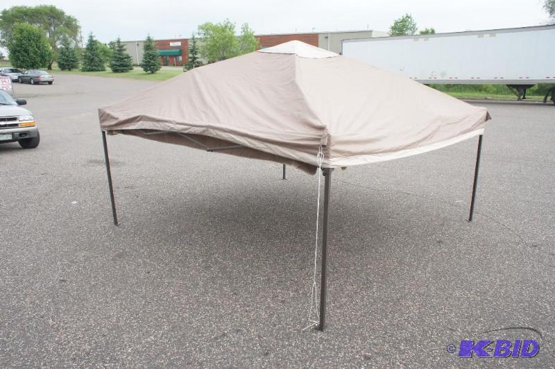lot 7 image: Portable Patio Gazebo  Tan. Approx...