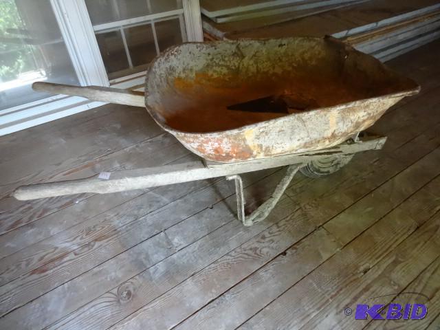 Rubber tired wheel barrow. Bucket i...