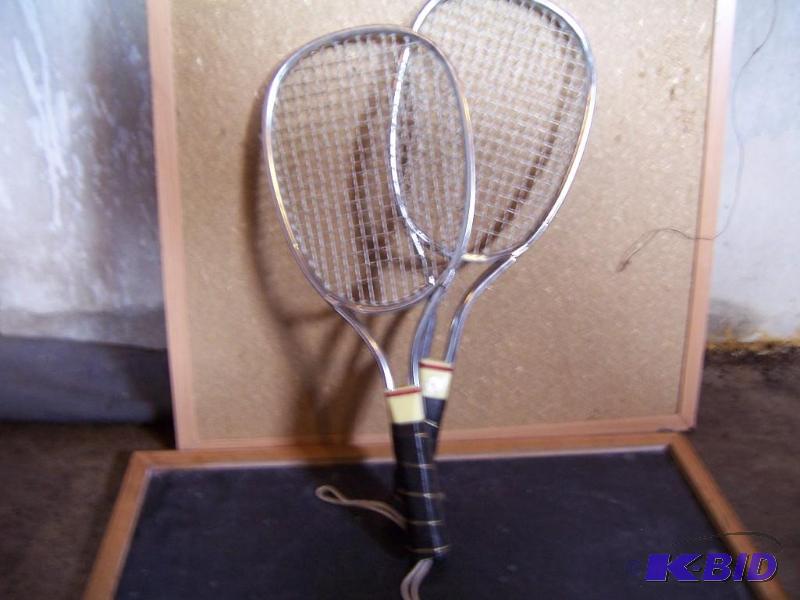 2 tennis rackets (used)...