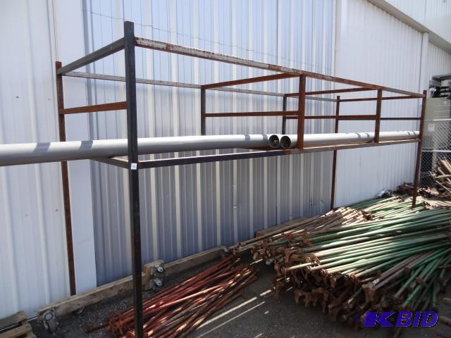 lot 132 image: Large metal rack used for storing m...
