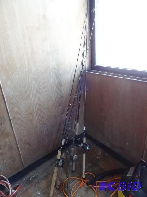 lot 155 image: 4 fishing reels with rods. 2 fishin...