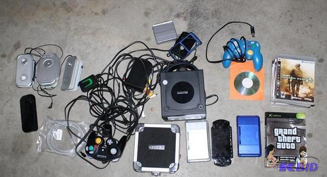 lot 102 image: Box of game consuls and games. Nint...