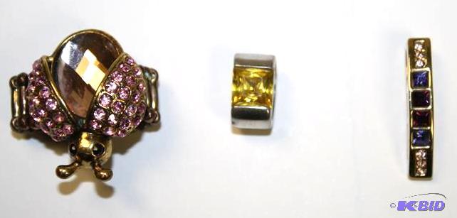 lot 110 image: Gold looking pendent with stone, ri...