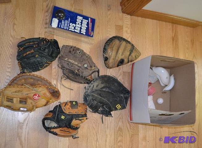 lot 179 image: Baseball gloves...