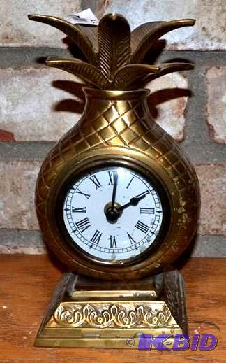 lot 21 image: Heavy Brass Pineapple Clock in work...