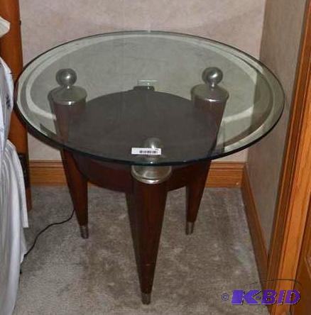 lot 45 image: Glass end table 28" diameter x...
