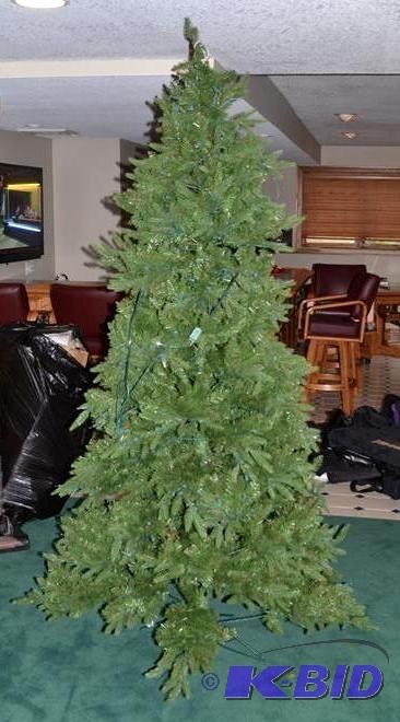 lot 63 image: 8 Tall Christmas tree....