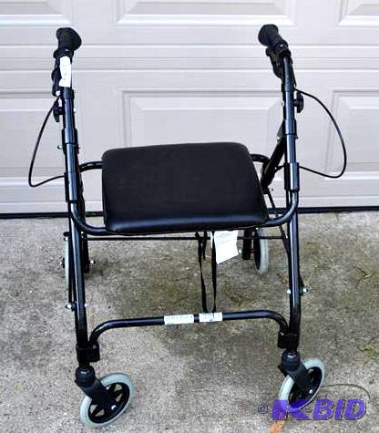 lot 72 image: Lumex Walker with 4 wheels and seat...