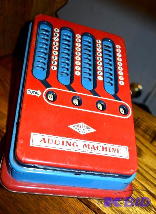 lot 75 image: Vintage Wolverine Tin Adding Machin...