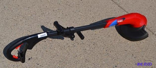 lot 85 image: Toro 11" Electric Trimmer Mode...