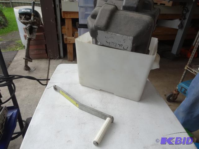 lot 108 image: Marine battery box. Crank handle...