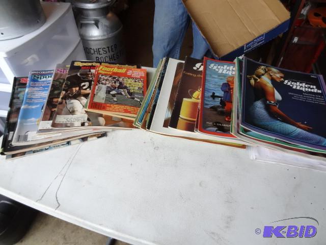lot 132 image: Sports illustrated magazines. Golde...