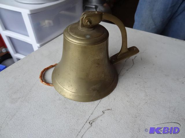 lot 134 image: brass bell...