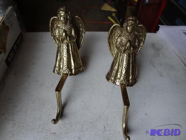 lot 135 image: Brass angel stalking holders...