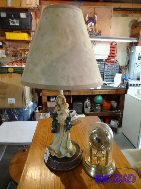lot 294 image: Mother holdong baby table lamp. Buc...