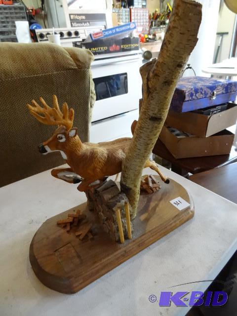 lot 321 image: 10 point buck carved by Frank Schri...
