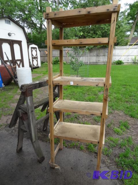 lot 45 image: 2 saw horses and wood shelf. 25 x 1...