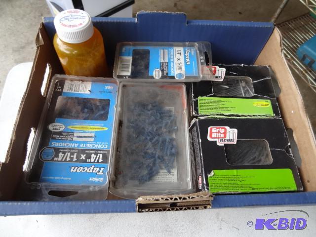 lot 64 image: Tapcon screws and finish nails. Fis...
