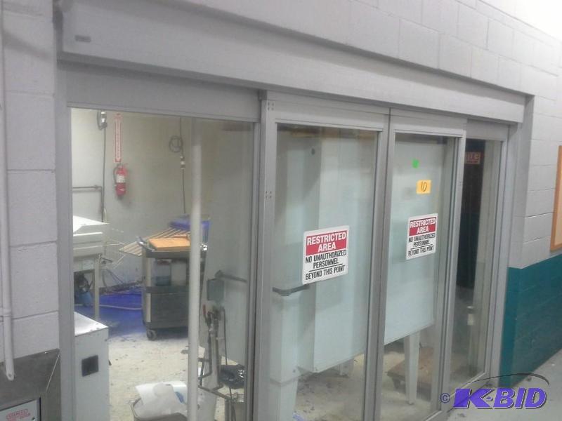 lot 10 image: Stanley Magic Door, Glass Sliding Door, With (2) Push Switch Activation,