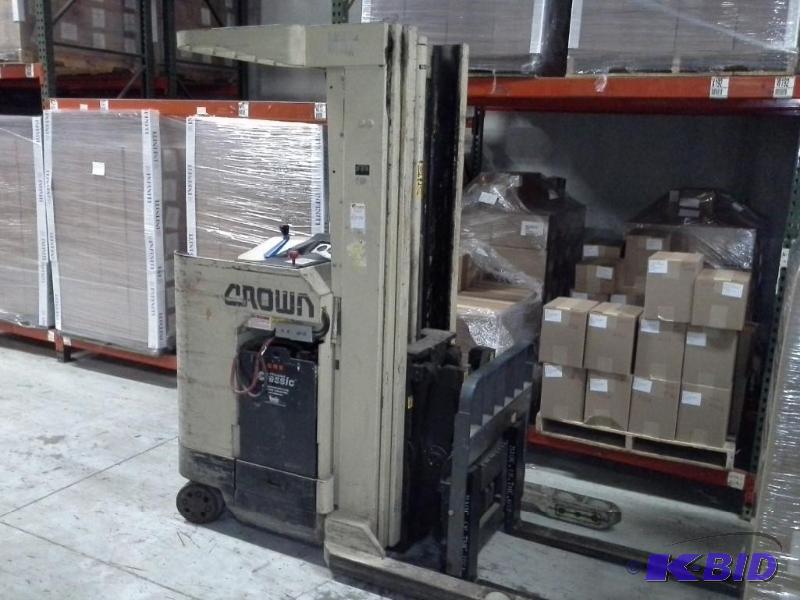 lot 51 image: Crown Electric Stand Up  Lift Truck With Charger