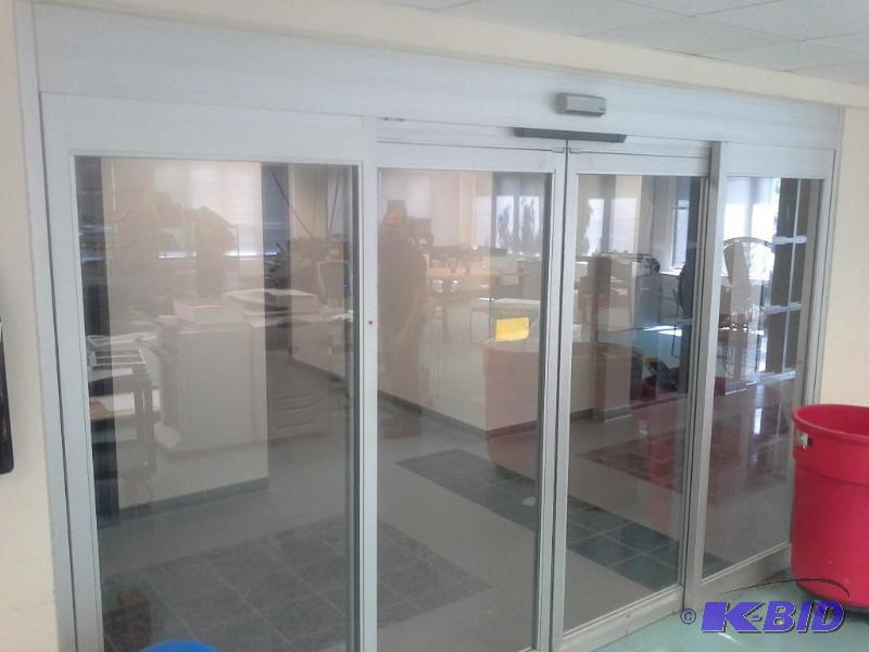 lot 517 image: Stanley Magic-Door, Glass Sliding Door, With Push Switch Activation, And Motion Detector.